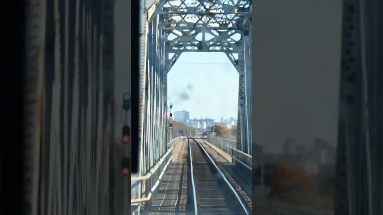 Crossing bridge and passing freight train AT SPEED! Trinity Railway Express, DGNO Mockingbird yard!