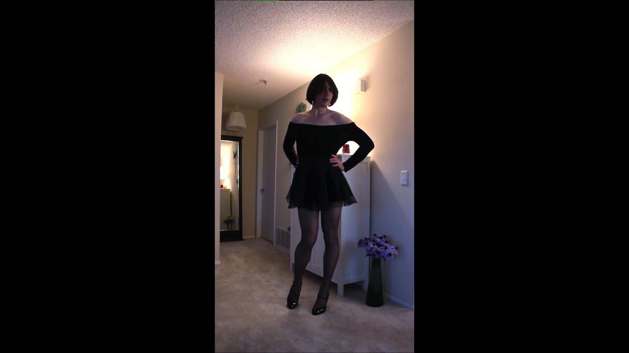 Crossdresser in Bodysuit and Miniskirt