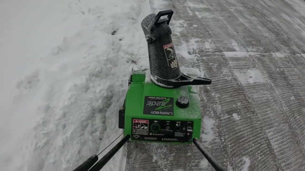 2/6/26,snow Joe and lawnboy doin driveway