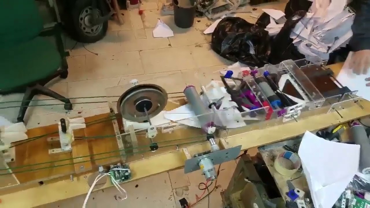 How to make a homemade paper plane folding machine