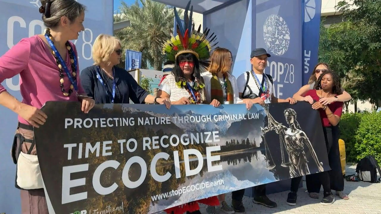 Climate activists protest at entrance to COP28 venue | AFP