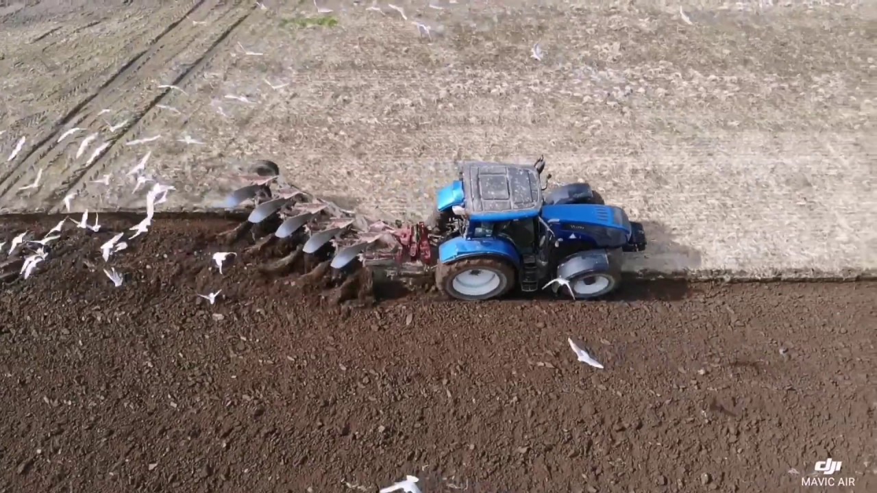 Valtra t213 ploughing