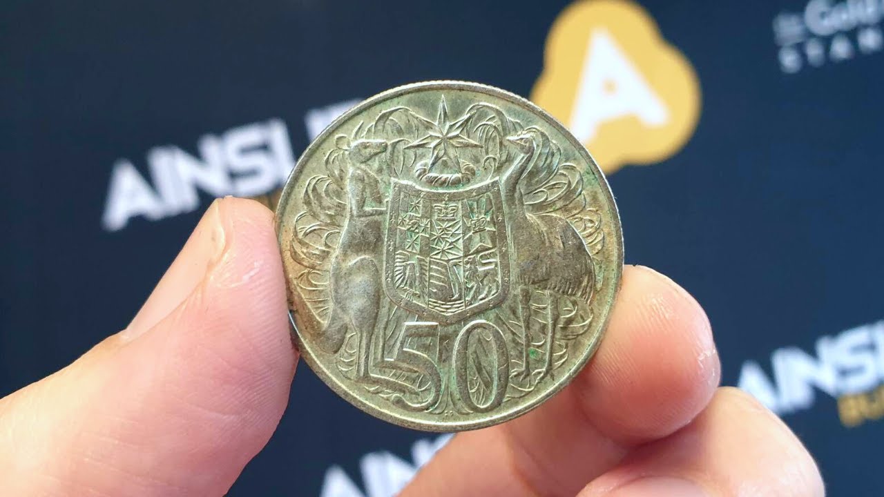 A ROUND 50c coin with REAL silver?