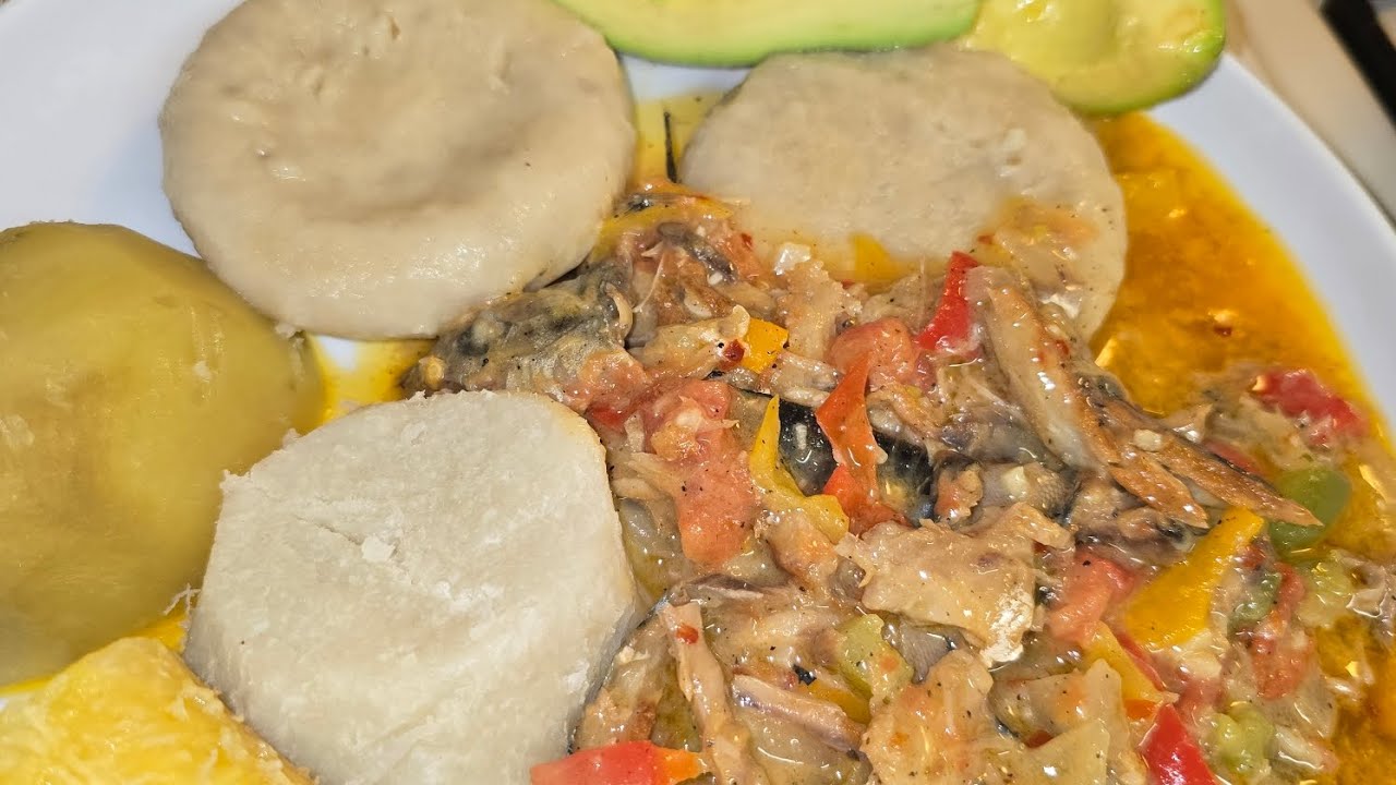 Salt mackerel rundown with boiled dumplings, yam,sweet potato, plantain and avocado 