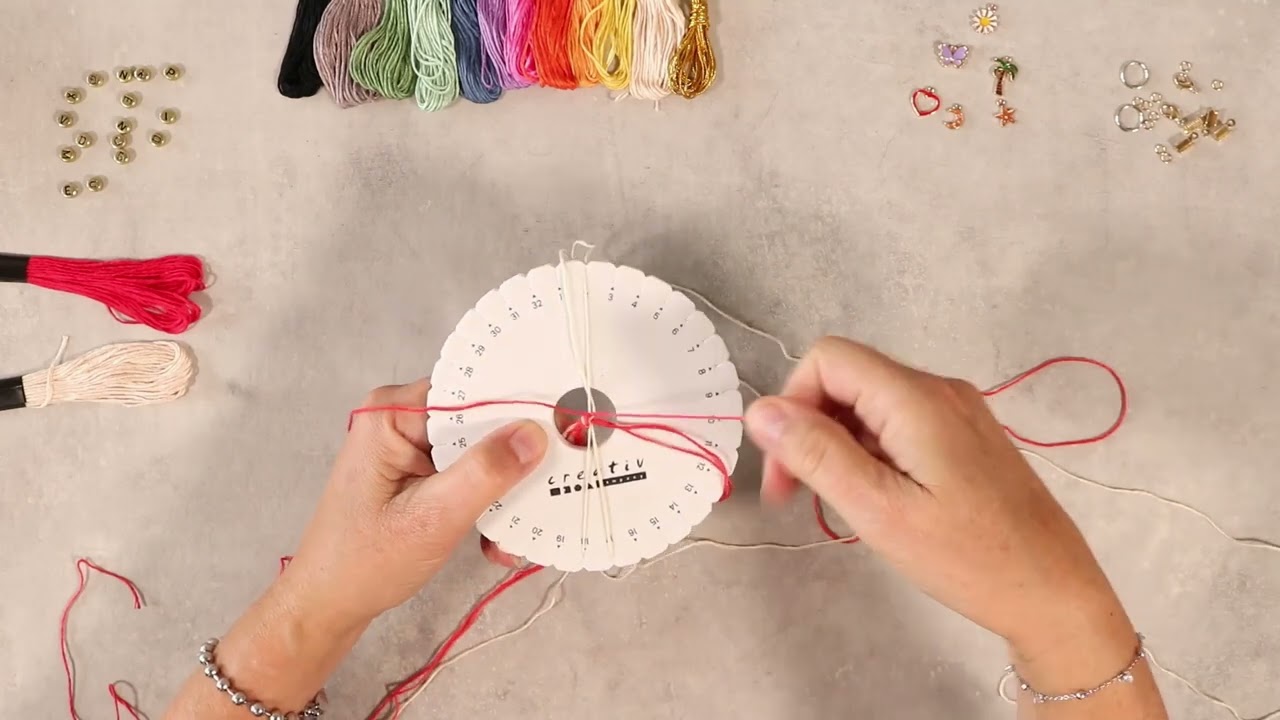 Learn to braid candy-striped pattern on a Kumihimo knotting disk
