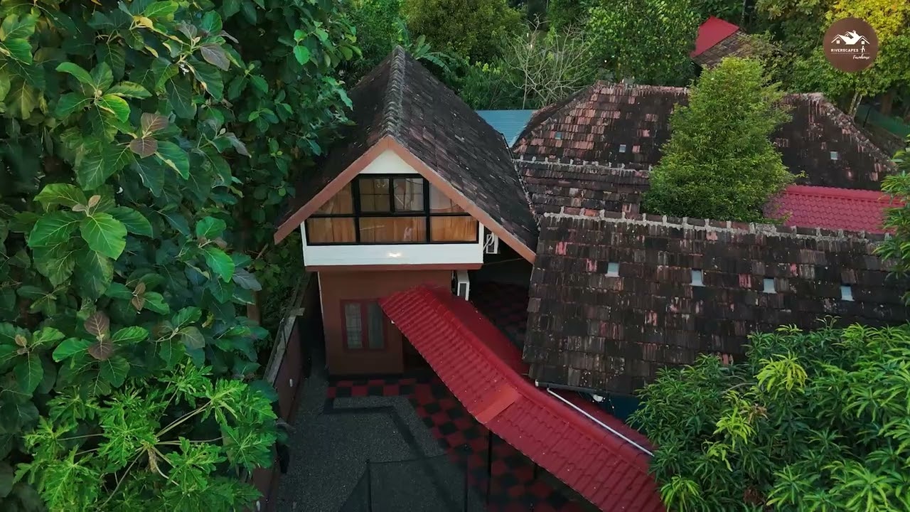 Riverscapes Homestay with Pool, AC Rooms, Homely Restaurant & Farm beside Periyar River Aluva Kochi.