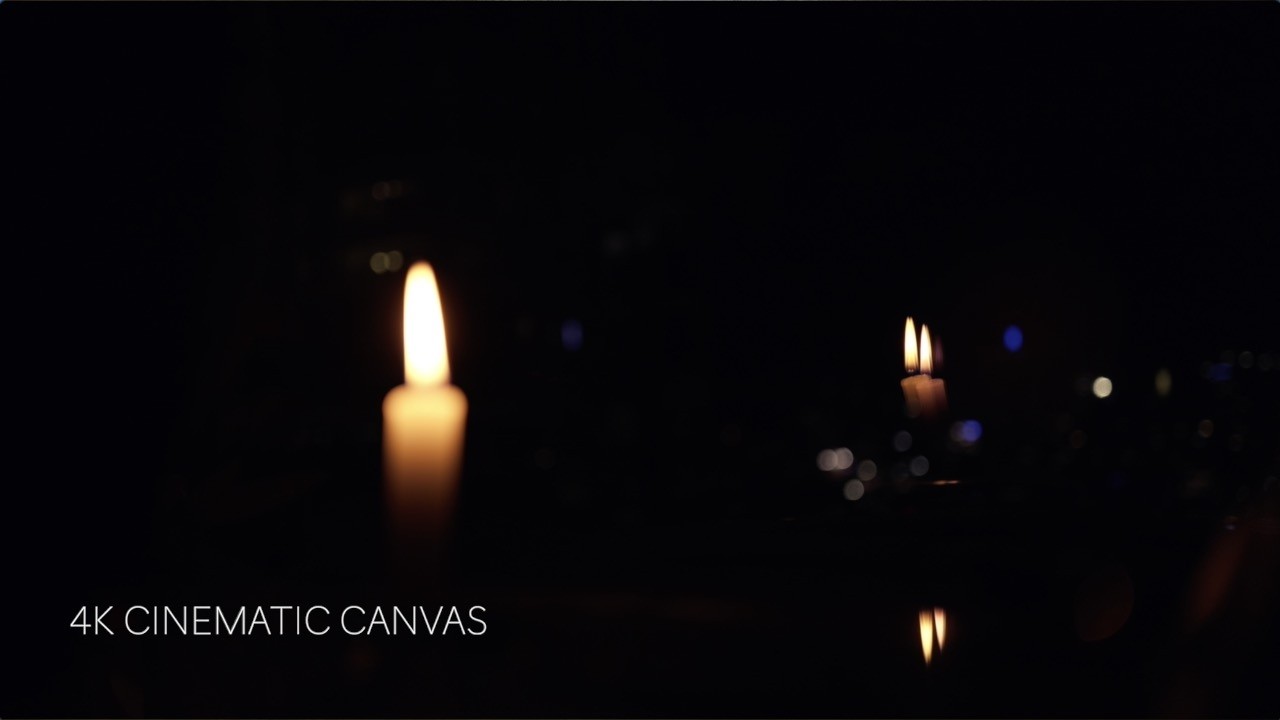 Melting Candle in City Window at Night Until it Goes Out