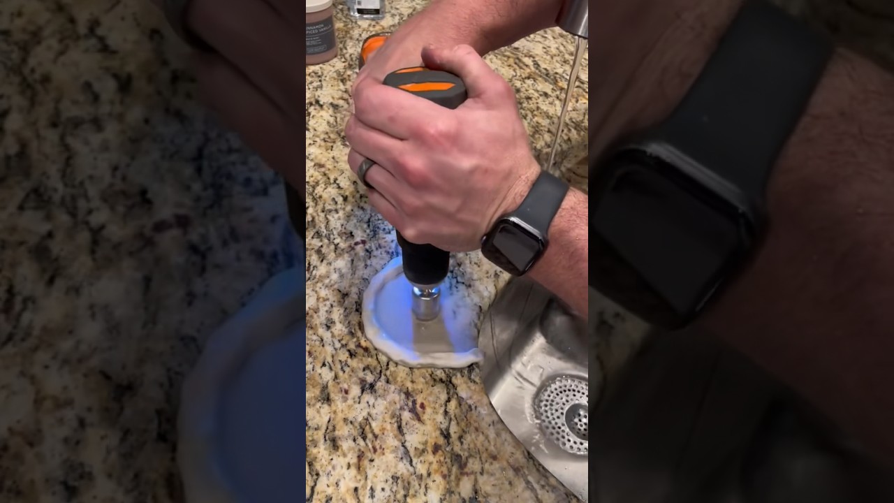 Drilling through a kitchen counter to install a reverse osmosis filtration system faucet. #plumber