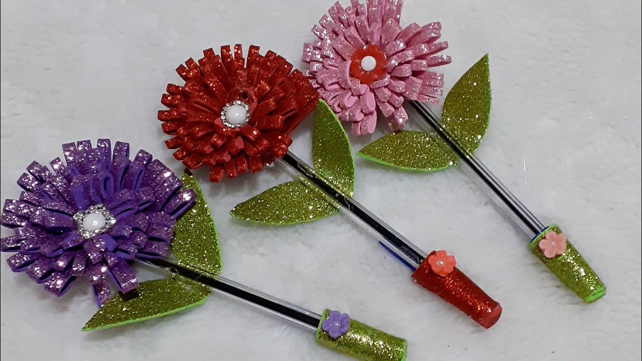 Canetas decoradas com flores em e.v.a.