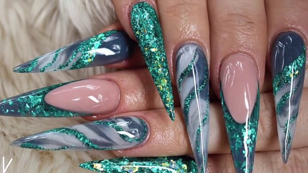Extreme length acrylic nails. Marble nails, reverse French glitter nails