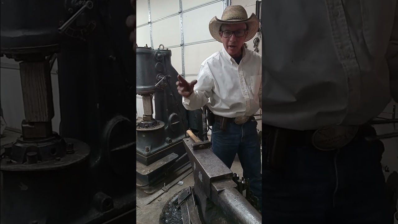 Gordon Williams forging a dragonfly.