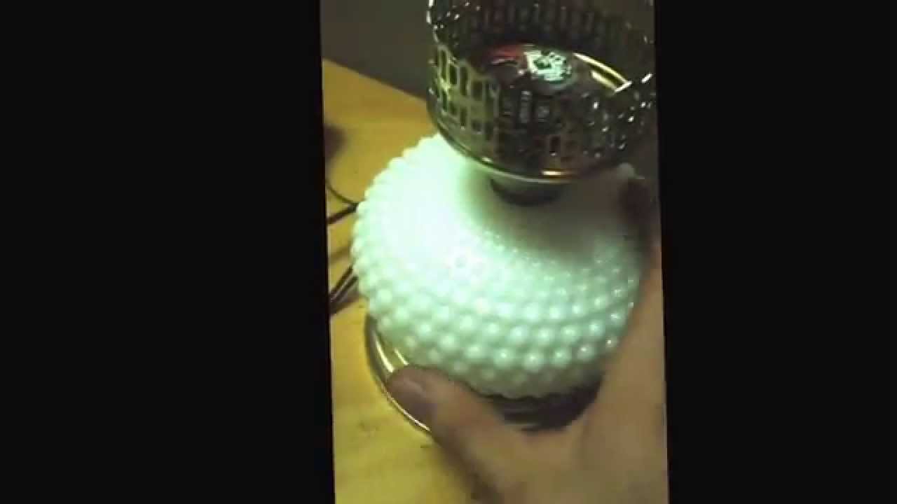 LED light (and candle simulator) I built from an old light for my wife's bday.