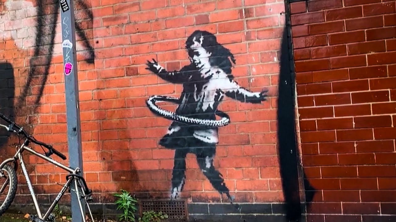 New Banksy Mural Shows Girl Using Bike Tire as Hula Hoop