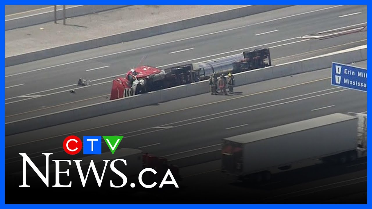 Driver dies after transport truck carrying dangerous goods crashes on Hwy. 401