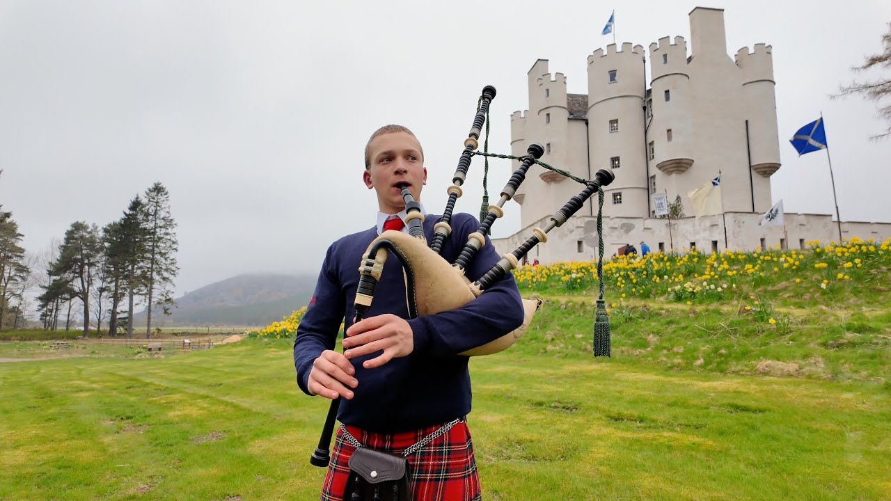 Piper Calan Daniels playing Cork Hill & The Fittie Boatman outside Braemar Castle in Scotland 2024