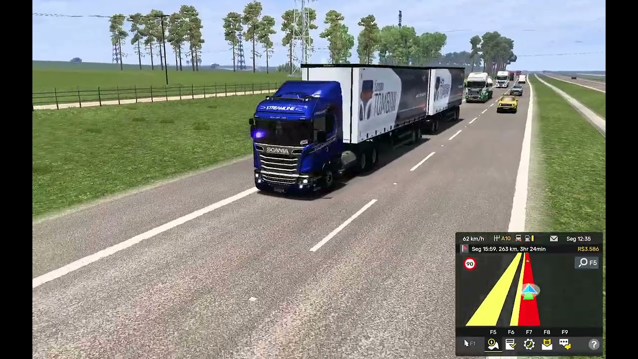 saindo da fazenda carregado de bobina de aço, scania no rodotrem