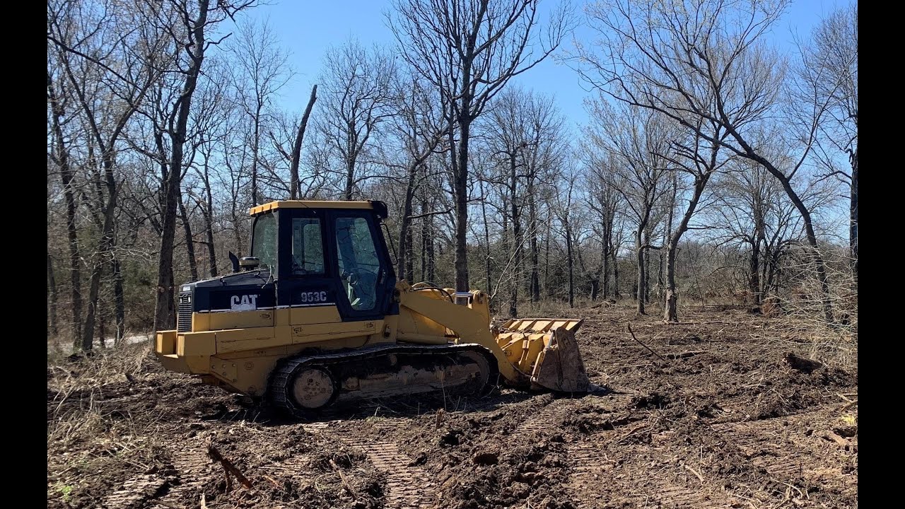 Cat 953C and Kobelco SK210 clearing 1.9 acres!!