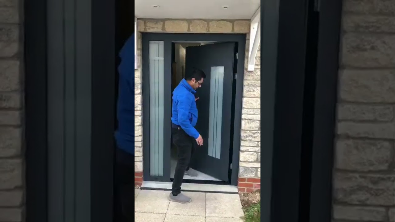 Schuco Aluminium Front Door Diamond Series 90mm Door with a Side light in Oxford