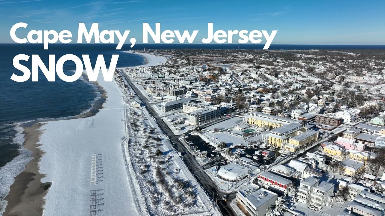 Cape May, New Jersey covered in winter snow at Christmas. Aerial bird&rsquo;s eye drone view in 4K.