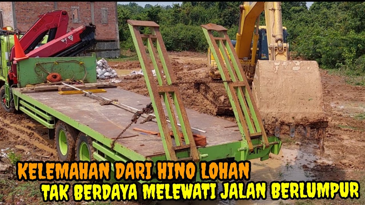 Truk Hino FM 260 TI Tak Berdaya Melewati Jalan Berlumpur Saat Mobilisasi Excavator