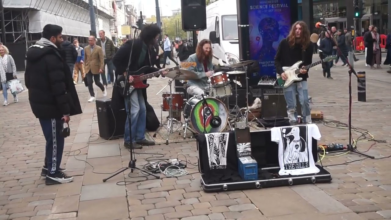 The Gulls sing Lightning their own song in Market Street Manchester