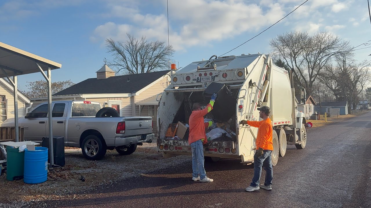 Village of Hartford International Leach rear loader garbage truck on manual trash