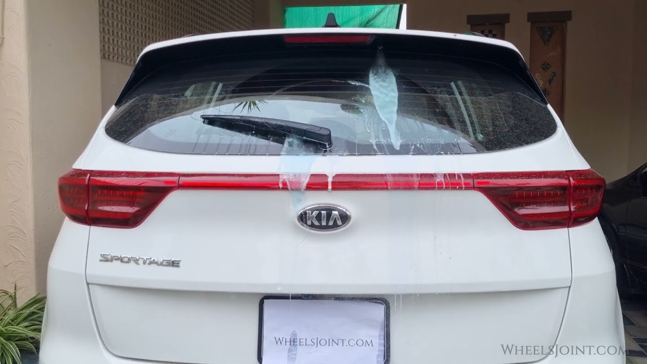 How to use rear window washer in Kia Sportage