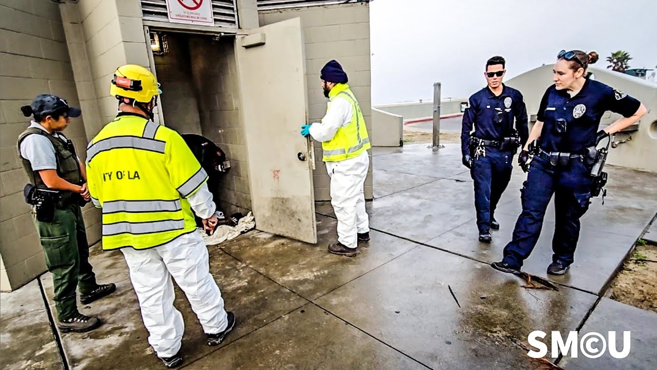 Police Officers and Park Rangers Oversee Homeless Encampment Cleanup Operation in Venice Beach