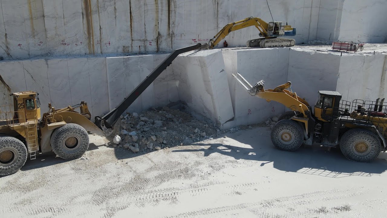 Heavy Machines In Action At Marble Quarries