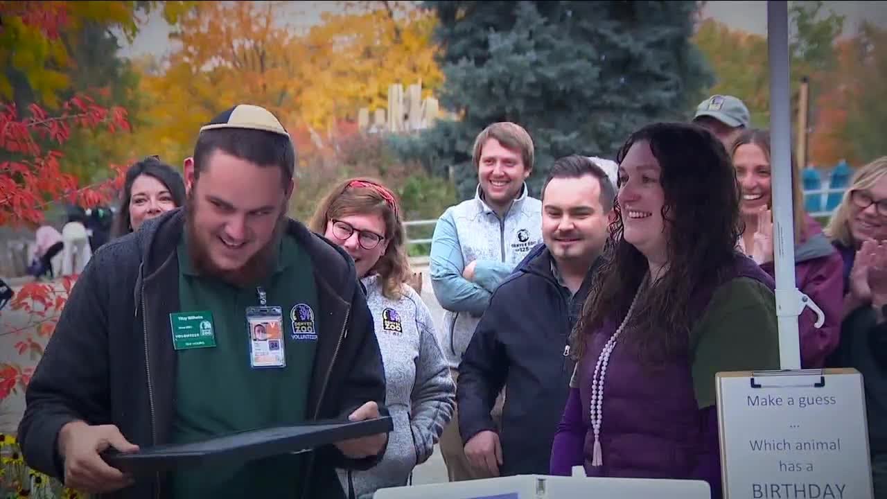 Denver Zoo volunteers sharing their knowledge of animals with guests