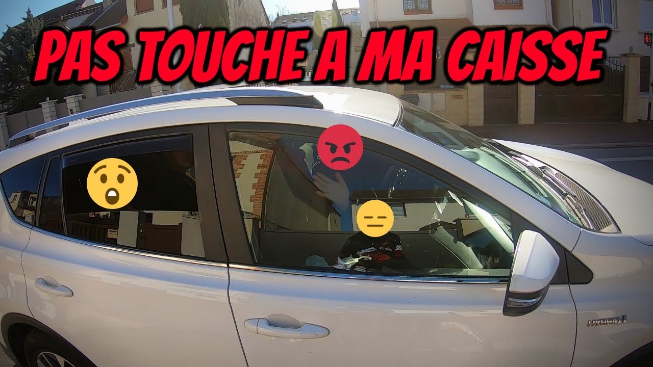 Voiture vs vélo: le conducteur n'est pas content car j'ai touché à sa voiture !