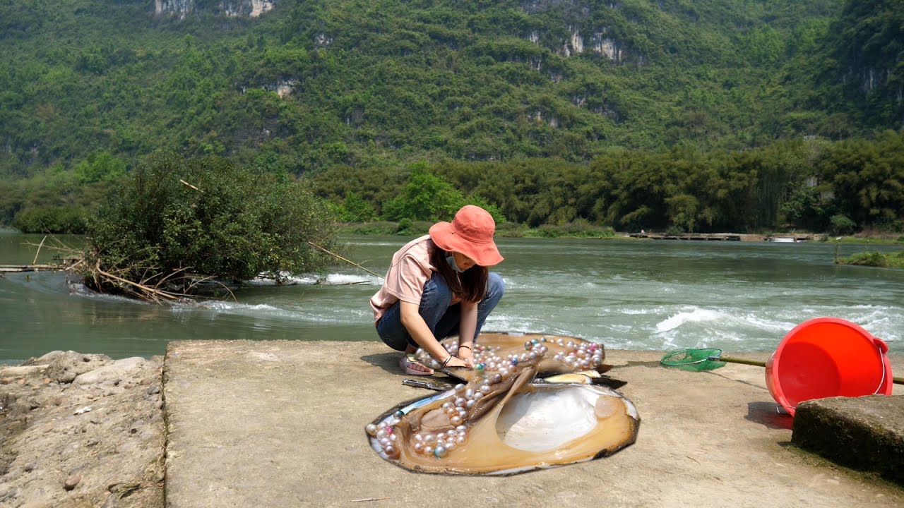 What a surprise! We found a giant river clam, and the pearl was just as big.