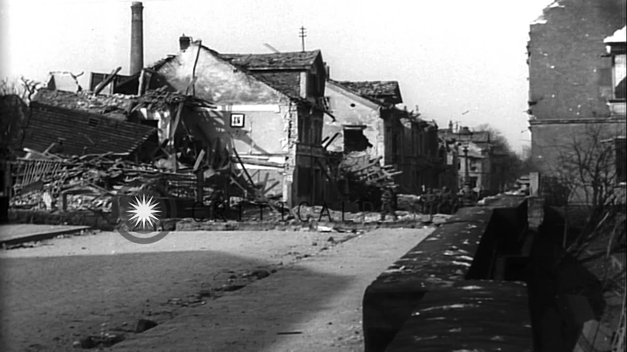US infantrymen climb over a wall while advancing in Worms, Germany during World W...HD Stock Footage