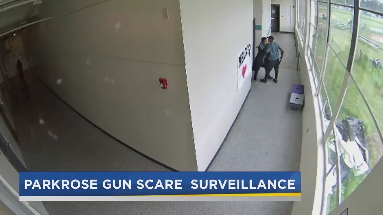 Watch: Parkrose HS coach Keanon Lowe takes gun from student, embraces him