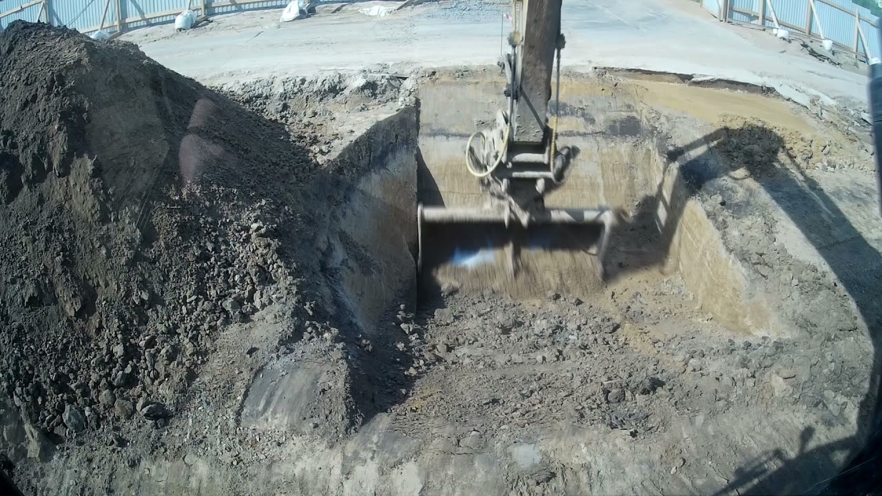 Работа экскаватора планировочным ковшом