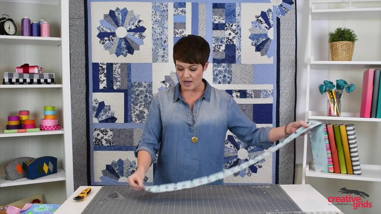 Секреты переплета раскрыты с помощью ножницы для сгибов Creative Grids®