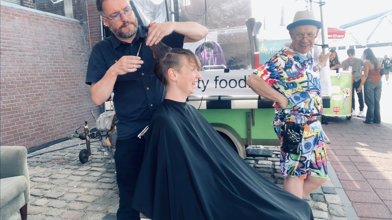 Street haircut! A makeover at the Vierdaagse in Nijmegen doing charity haircuts with Theo Knoop