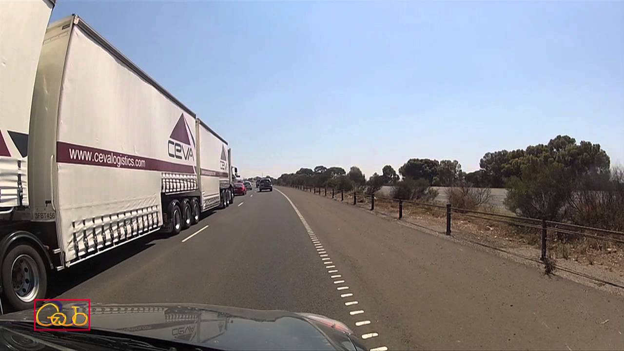 Passing A Road Train On Busy Australian Freeway in Melbourne