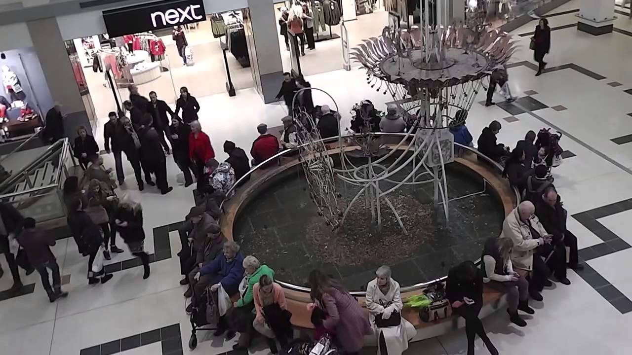 the big animated clock in the Vic centre in nottingham going off at the quarter hour.