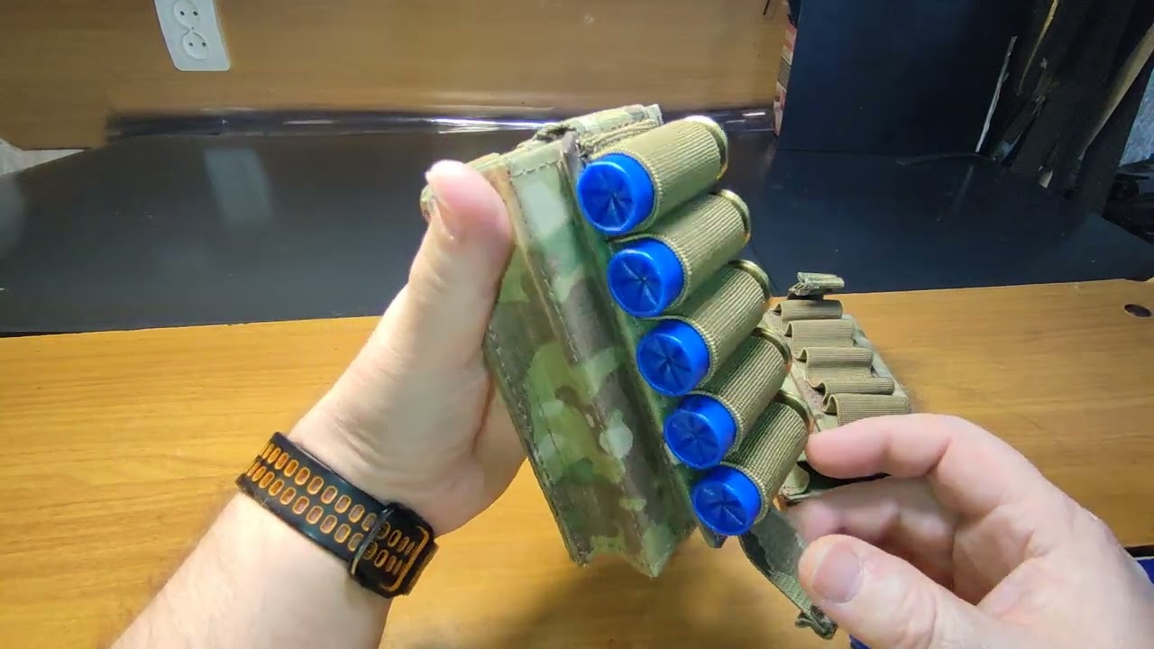 Два перекидих, замінних підсумка на 10 набоїв 12 калібра кожен .