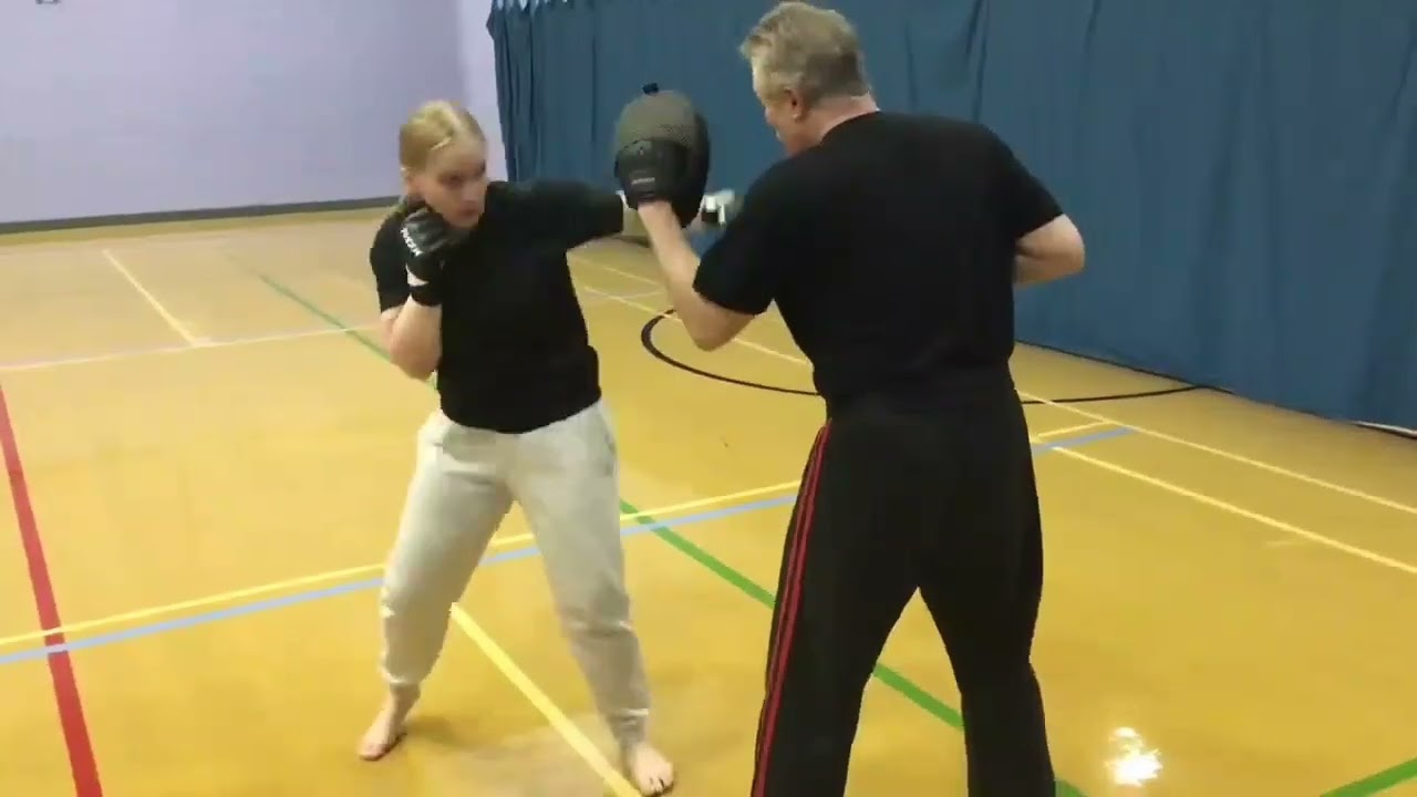 Tessa working on the focus mitts 🥊
