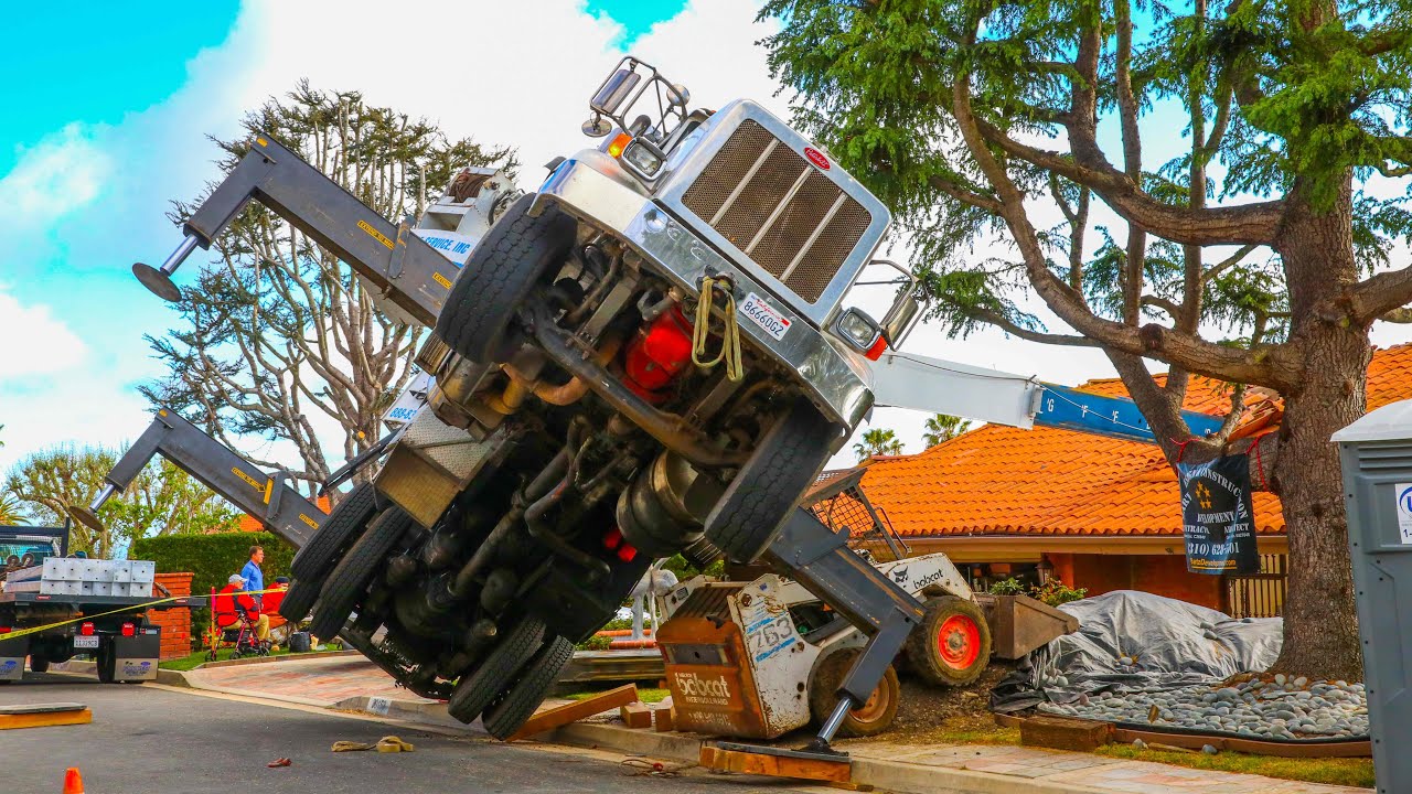Crane Fail! Crane Truck Goes Airborne: Falls On Upscale Home