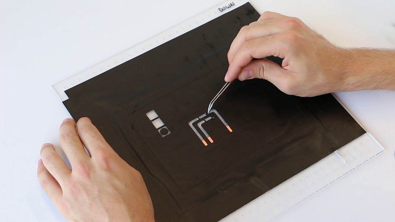 Silicone Devices: DIY Fabrication of Self-Contained Multi-Layered Soft Circuits using Microfluidics
