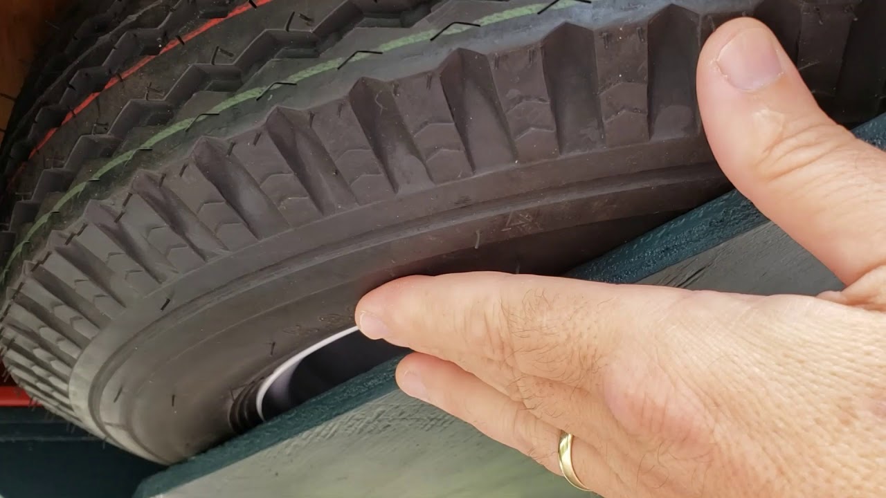 Storing Spare Tire on Bottom of Harbor Freight Trailer