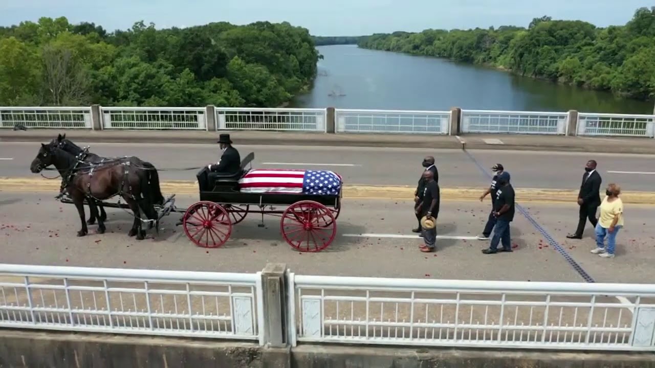 Congressman John Lewis' casket makes final journey across Selma bridge