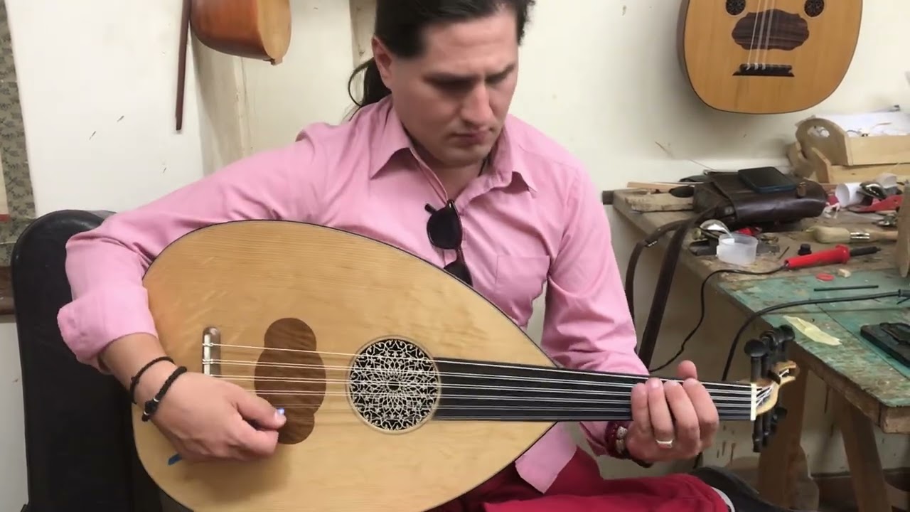 Flamed walnut-bearclaw spruce arabic oud played by ILIAS