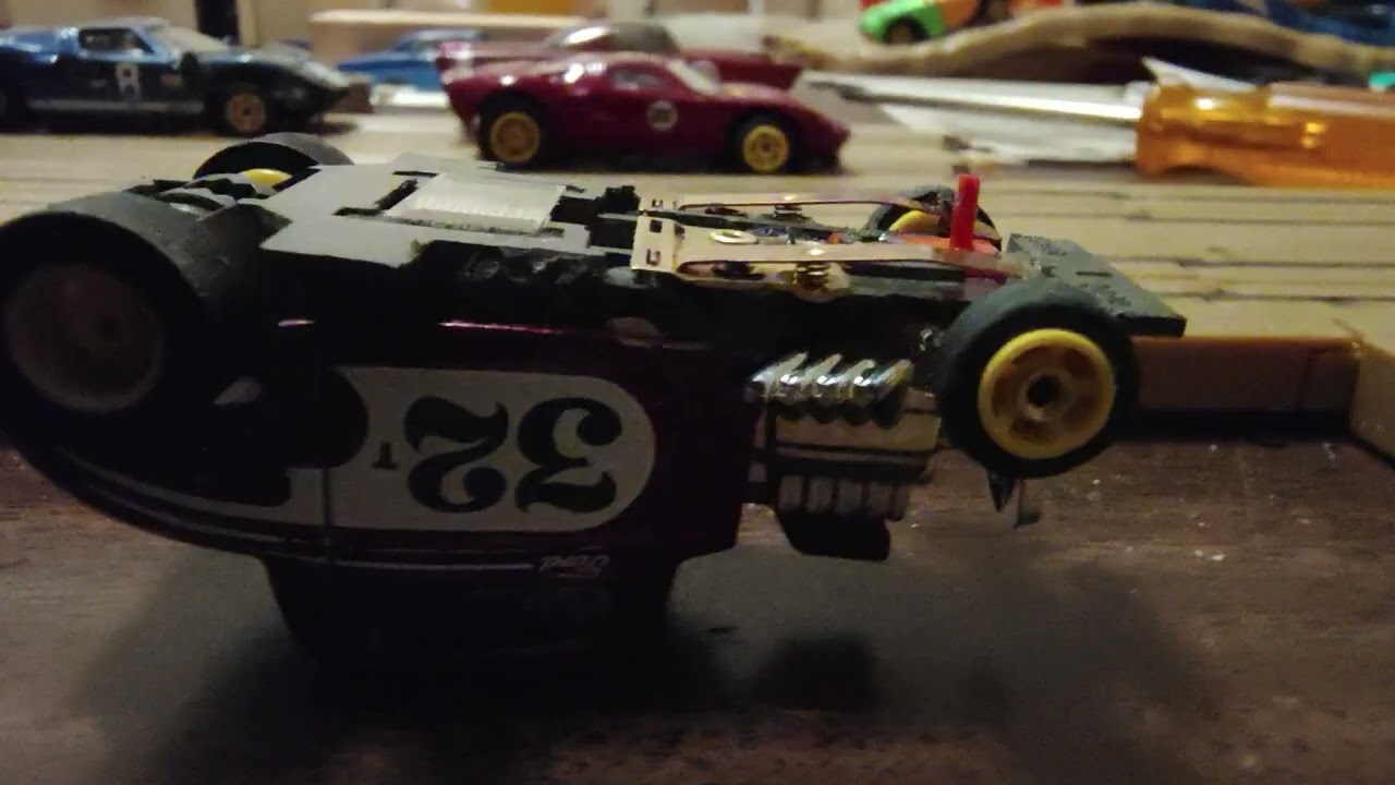 Ho diecast 32-3 window coupe made into a slot car pick up shoe issue