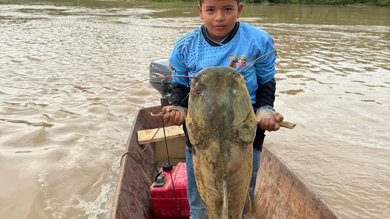 Pescado con mis dos hijos moustros de rio