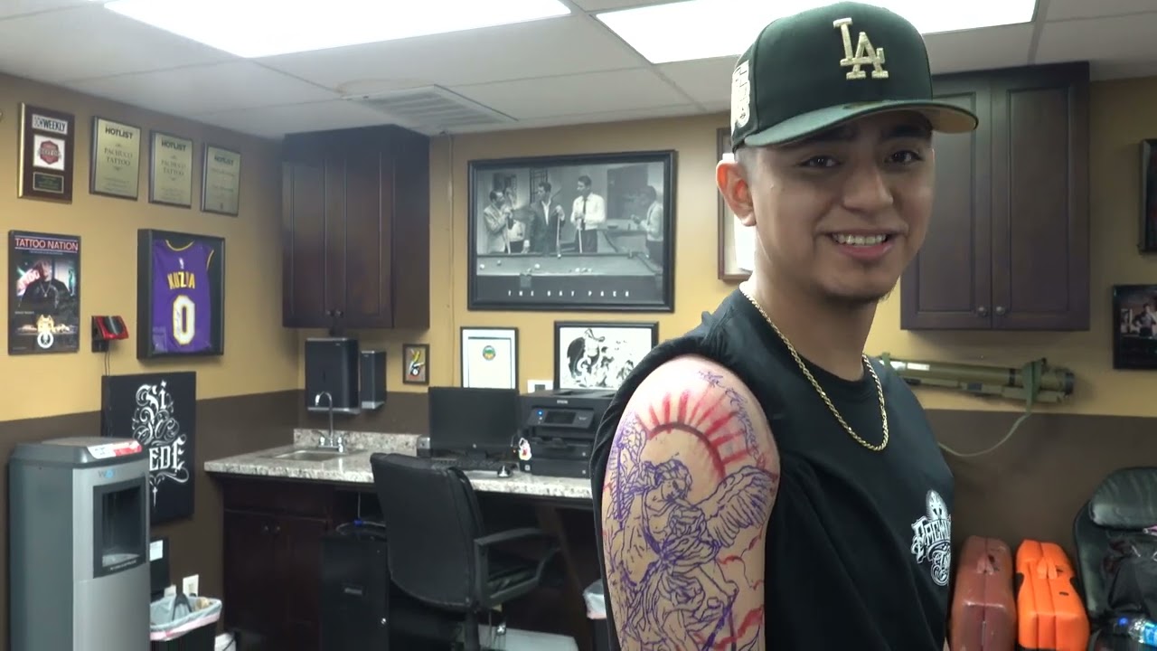 CLIENT ALMOST TAPPED ON HIS TATTOO!