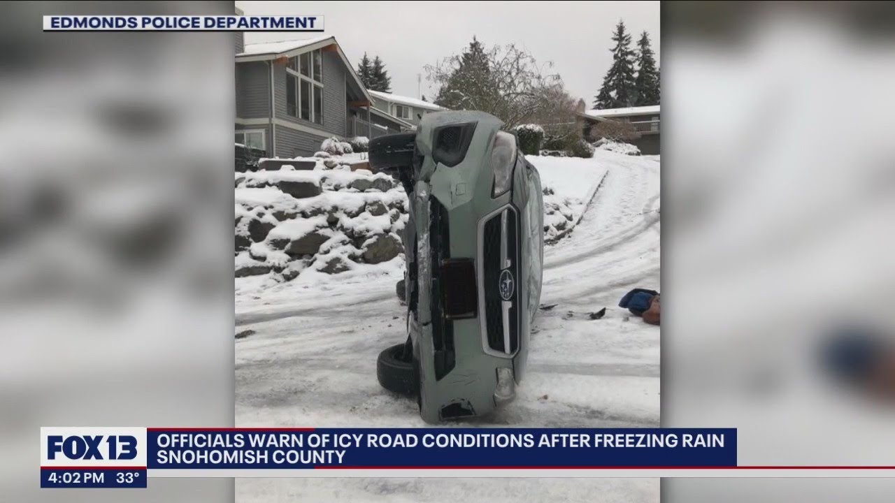 Car flips over on icy roads; officials warn drivers to stay home | FOX 13 Seattle